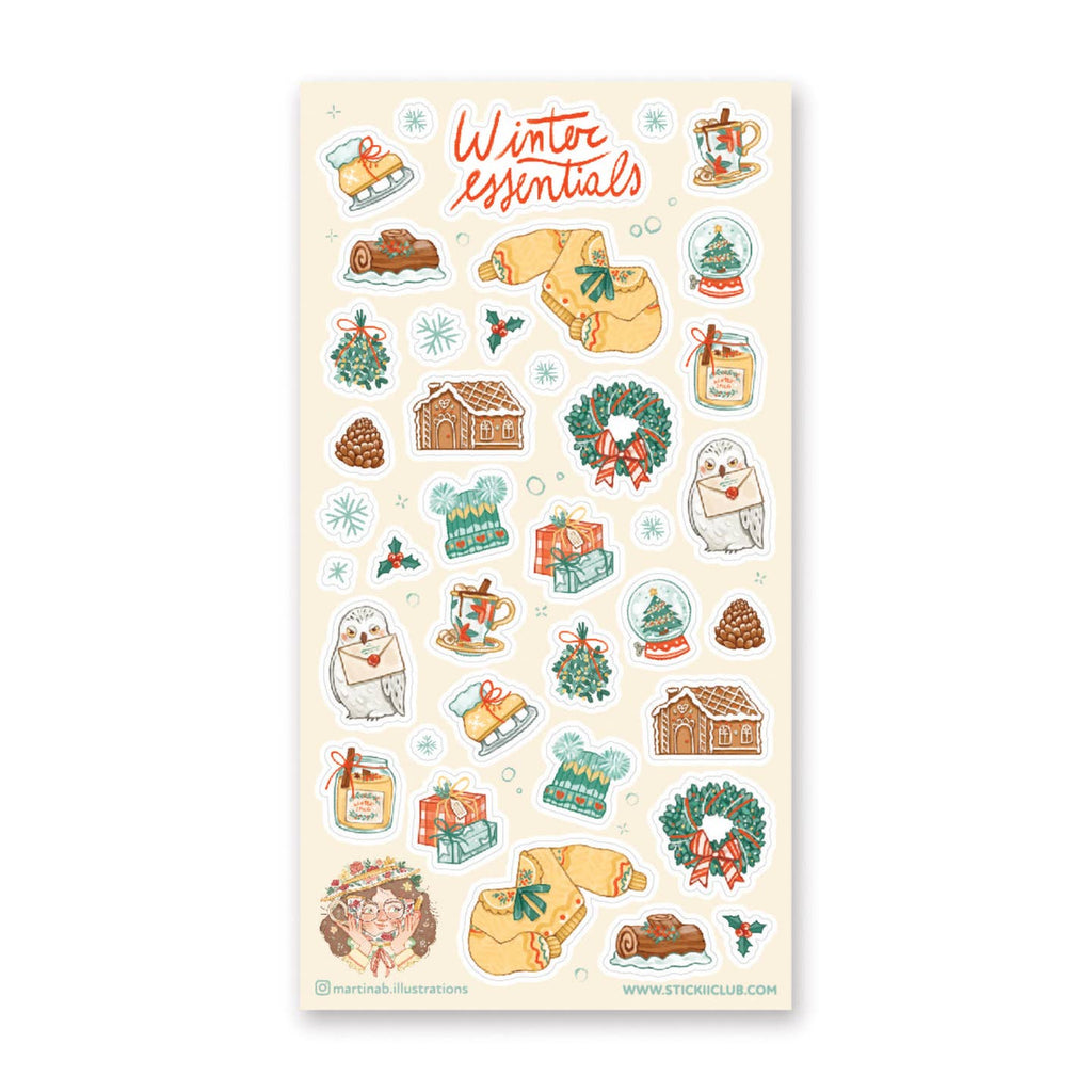 Sticker sheet with images of winter items including gingerbread house, ice skates, wreathes, sweaters and presents.