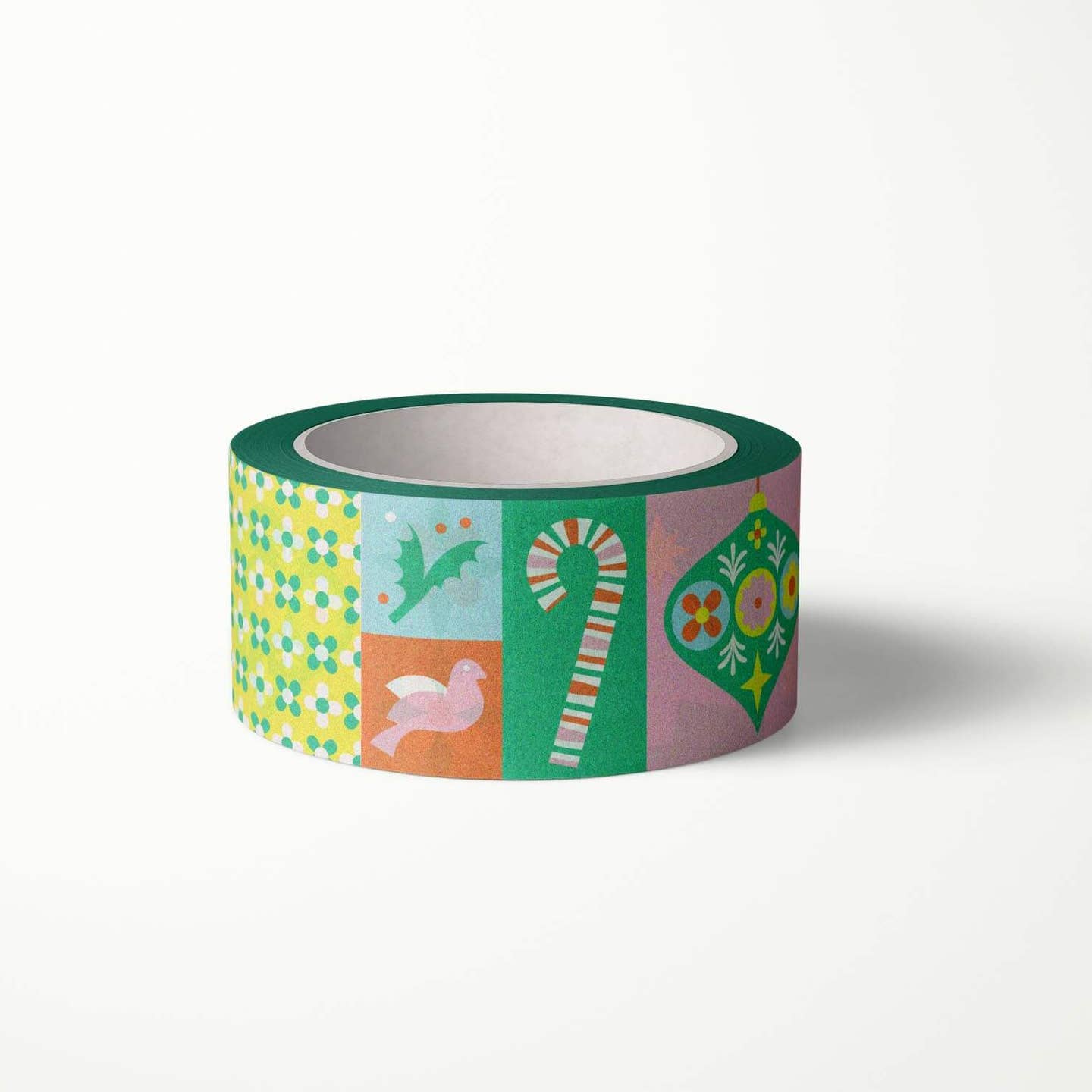 Decorative tape with colorblock design with images of candy cane, holly, dove, ornaments in green, blue, red and white. 