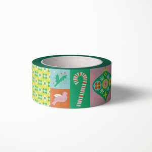 Decorative tape with colorblock design with images of candy cane, holly, dove, ornaments in green, blue, red and white. 