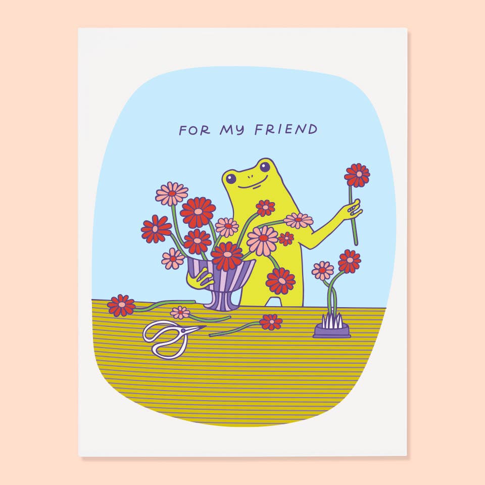 Greeting card with image of a frog putting together a flower arrangement and blue text says, "for my friend". Envelope included.