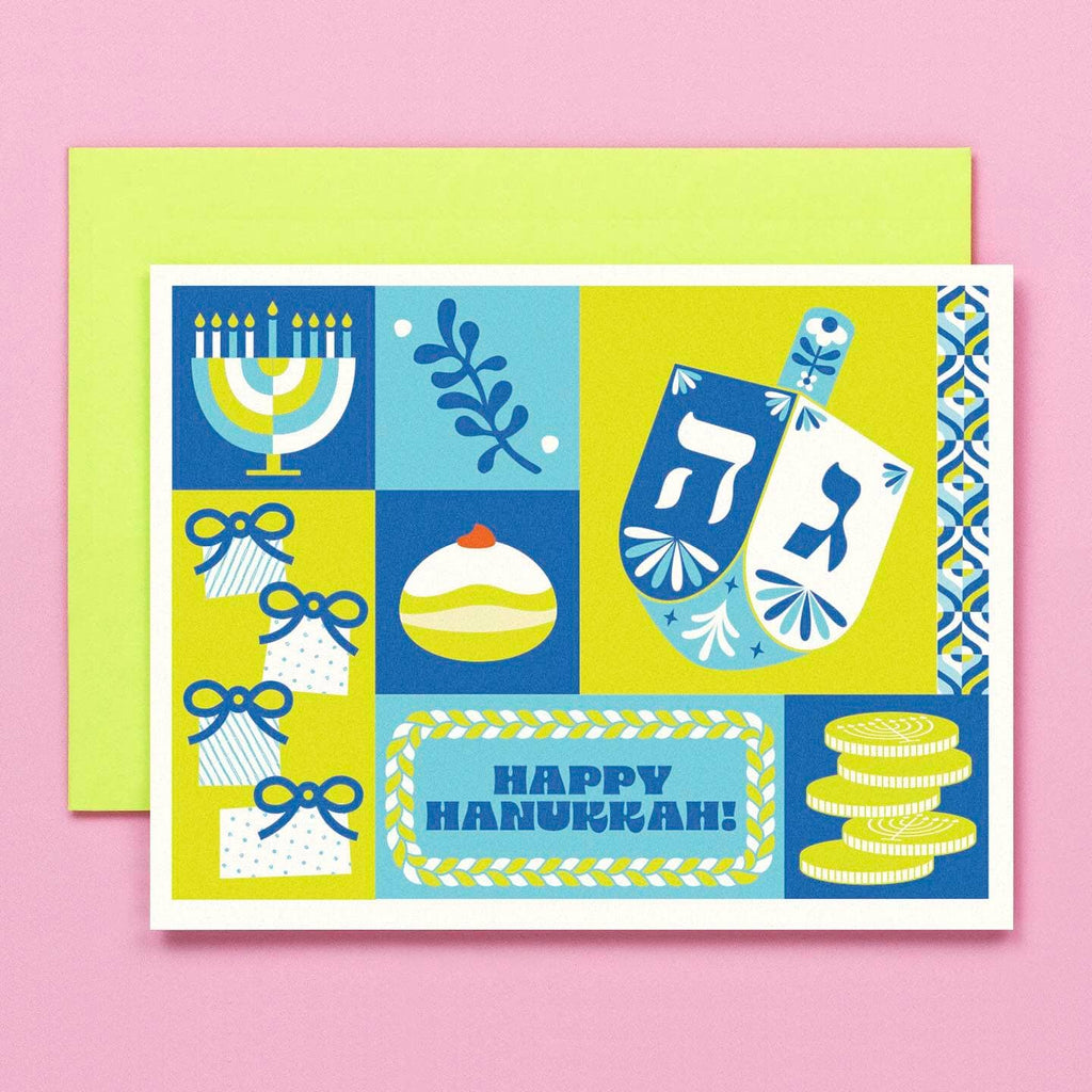 Greeting card with colorblock patttern in green, blue and white with retro floral dreidel, a menorah, a stack of presents, a jelly donut, a vaguely challah-esque pattern, and of course some gelt. Neon green envelope included. 