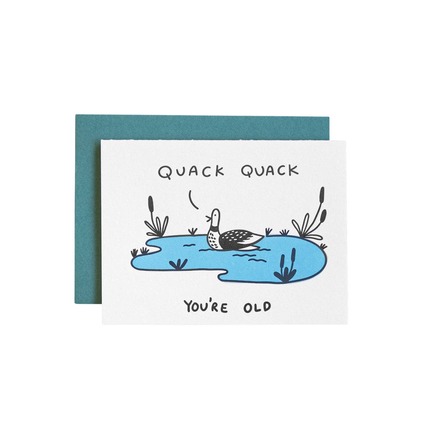 Greeting card with white background and image of a black and white duck on a blue pond. Black text says, "Quack quack, you're old". Green envelope included.