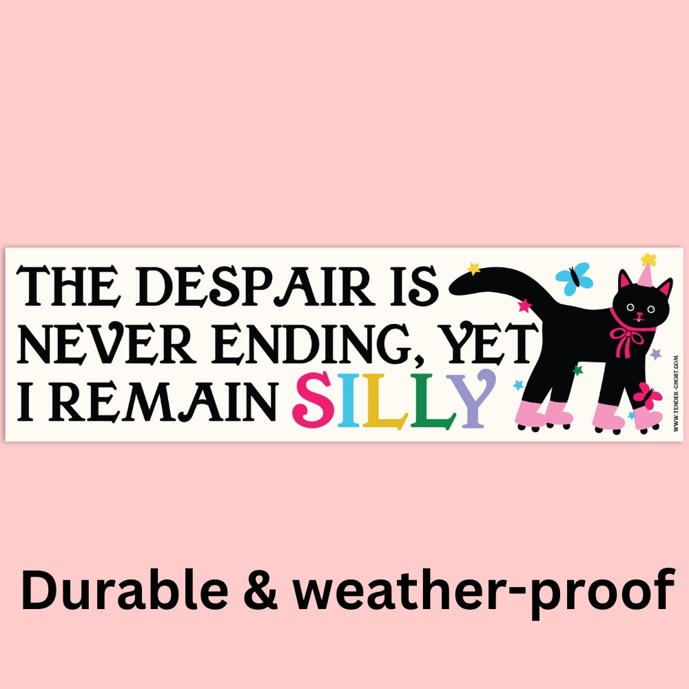 Sticker with white background and image of a black cat wearing pink roller-skates and a pink party hat with black text says,"the despair is never ending, yet I remain silly".