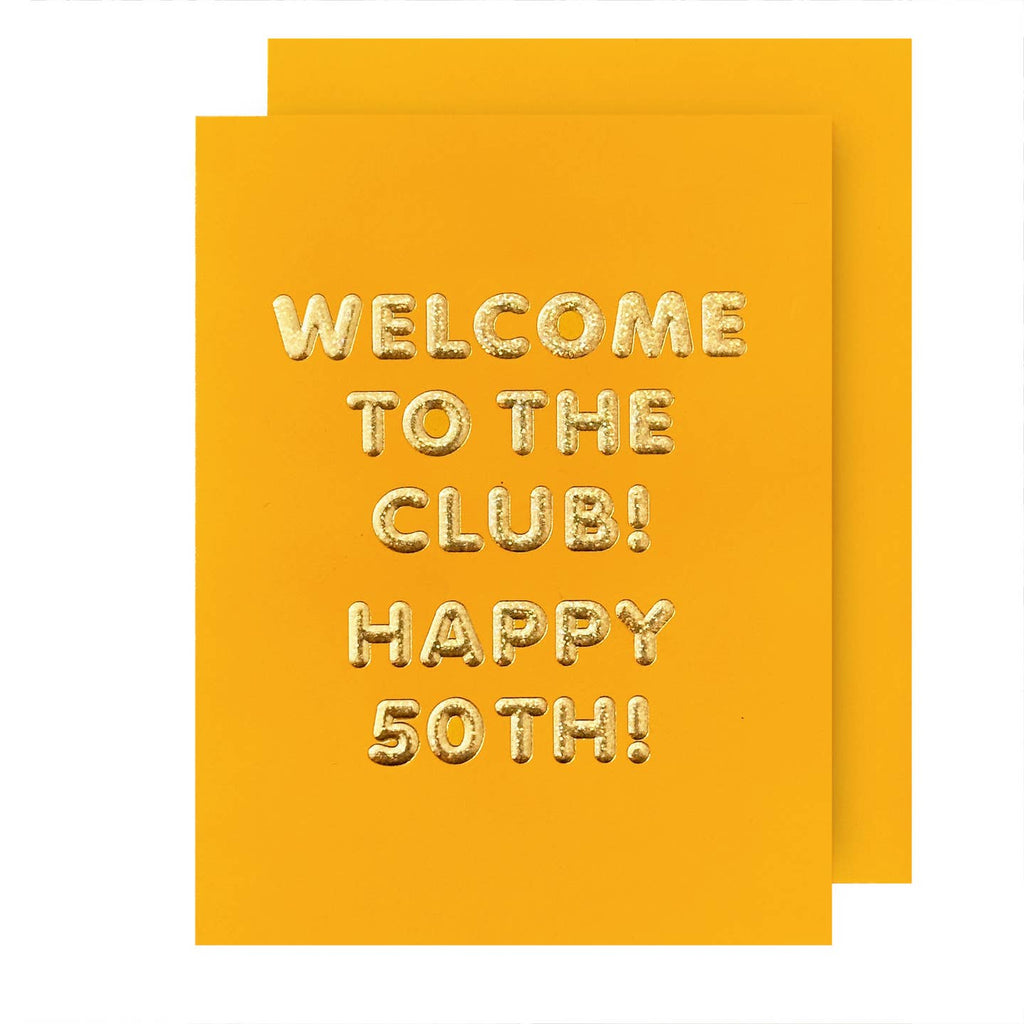 Greeting card with yellow background and gold foil text says, "Welcome to the club! Happy 50th!". Yellow envelope included. 