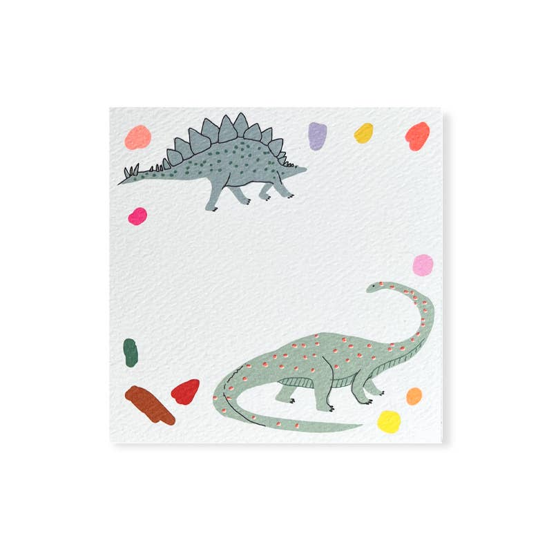 Notes with cream background and images of stegosaurus and brontosaurus in shades of green with dots in red, yellow, lavender and orange around the edge of note.