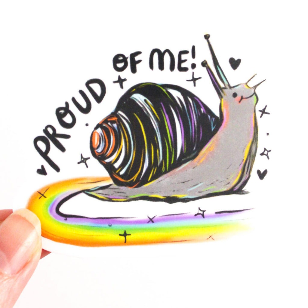 Image of sticker with white background with image of rainbow snail and black text says, "Proud of me!". 