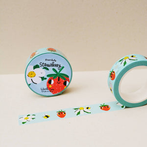 Decorative tape with pale blue background with images of white flowers, red strawberries and yellow and black bumblebees. 