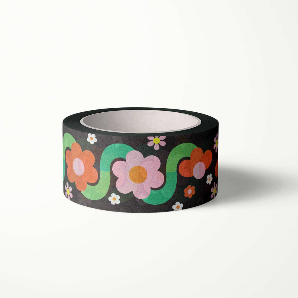 Decorative tape with black background and images of pink and red flowers with green stems. 