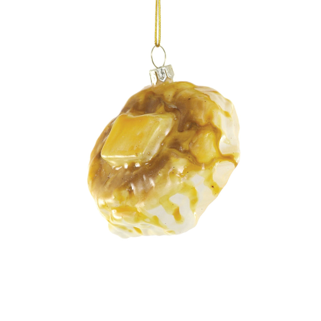 Image of a buttered biscuit ornament. 