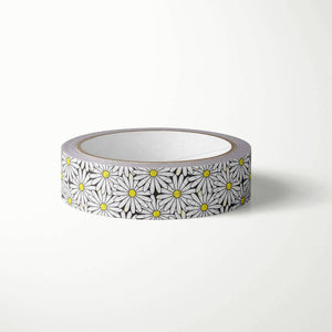 Decorative tape with black background with white daisies with yellow centers. 