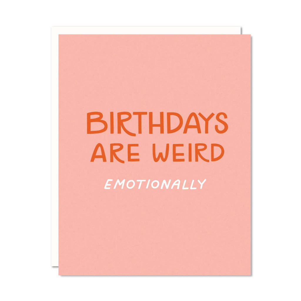 Pink background with red text says, "Birthdays are weird", white text says, "Emotionally". White envelope included. 