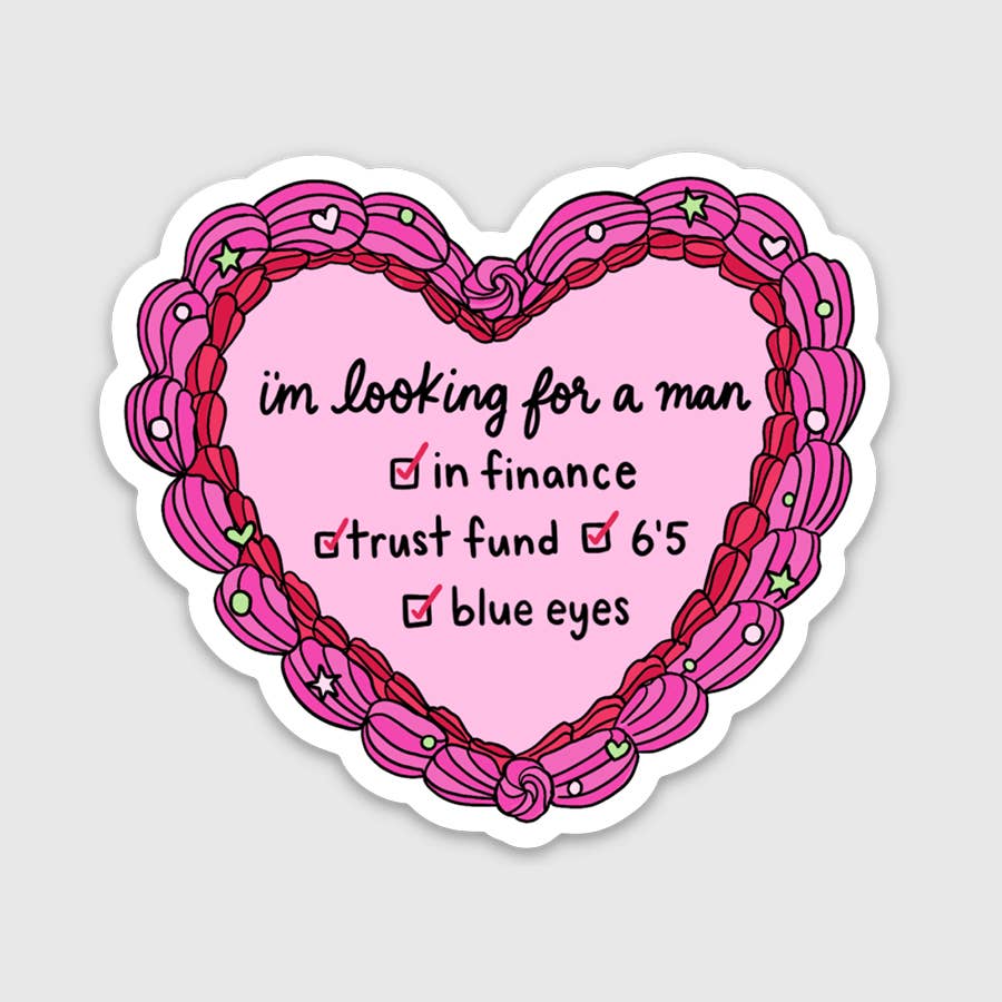 Decorative sticker in the shape of a heart with pink background and red and hot pink border. Black text says, "I'm looking for a man in finance, trust fund, 6"5 blue eyes". Black check boxes with red checkmarks of each. 