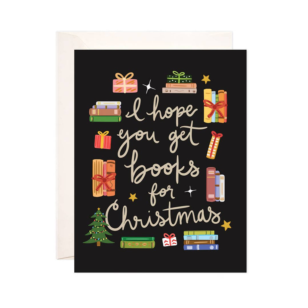 Black background with images of books wrapped up as gifts with ribbon and bows and tan text says, “I hope you get books for Christmas”. White envelope included. 