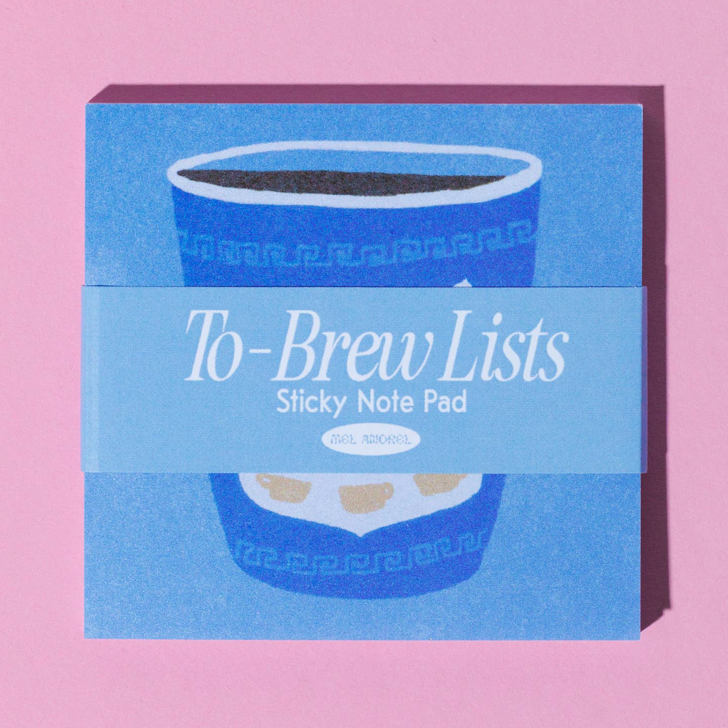 Sticky note pad with light blue background and image of a takeout coffee cup in blue with Grecian design.