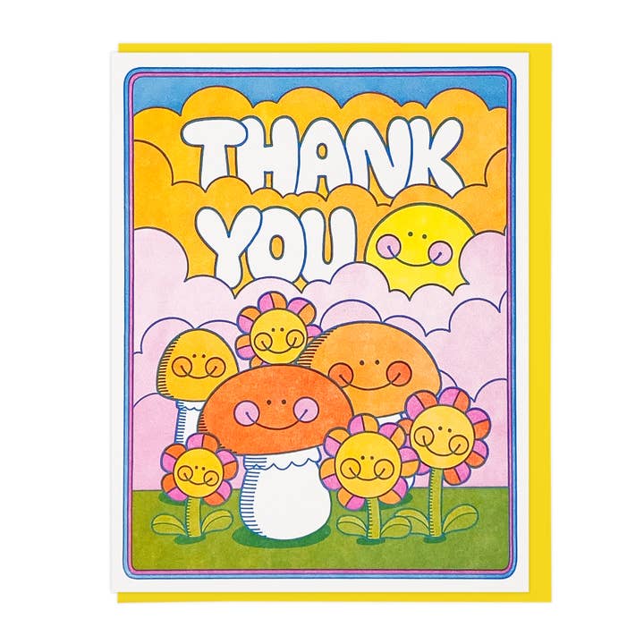 Greeting card with imageds of flowers and mushrooms in orange, yellow, pink, white and green with orange and pink clouds and yellow sun. White text says, "Thank you". Yellow envelope included. 