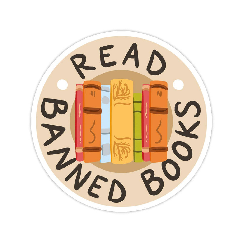 Circle sticker with tan background and white border with image of row of book bindings with black text says, “Read banned books”.