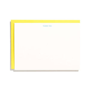 Ivory card with blue text says, "Thank you" at middle center of card. Yellow envelopes included. 