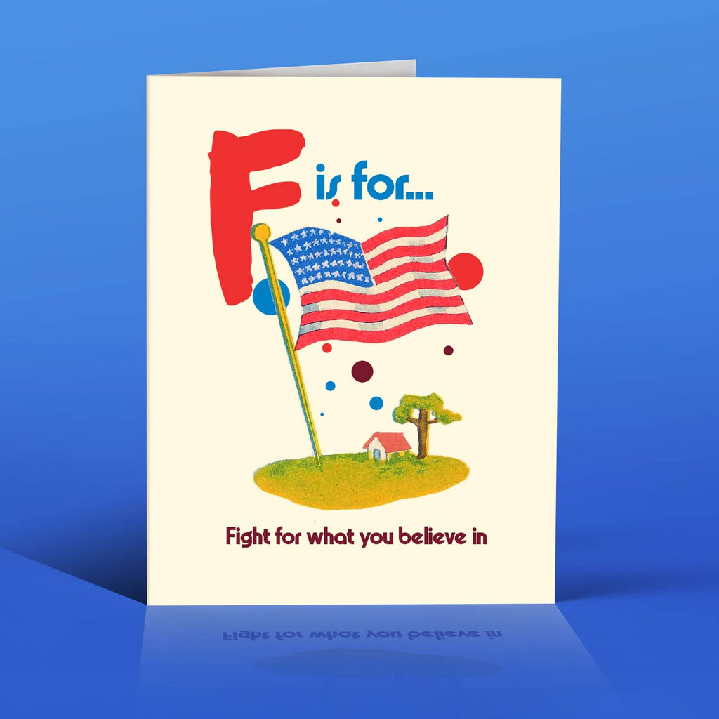 Greeting card with white background and image of an American flag and a house with a tree. Large red "F" and blue text says, "Is for..." and black text is "fight for waht you believe in". Envelope included.