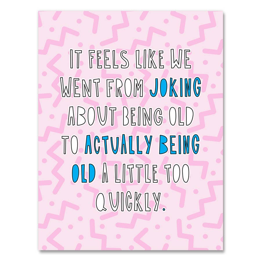 Greeting card with pink background with dark pink squiggles. White text says, "It feels like we went from joking about being old to actually being old a little too quickly." Envelope included. 