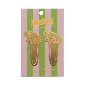 Brass page tabs in the shape of a frog on top of clip.