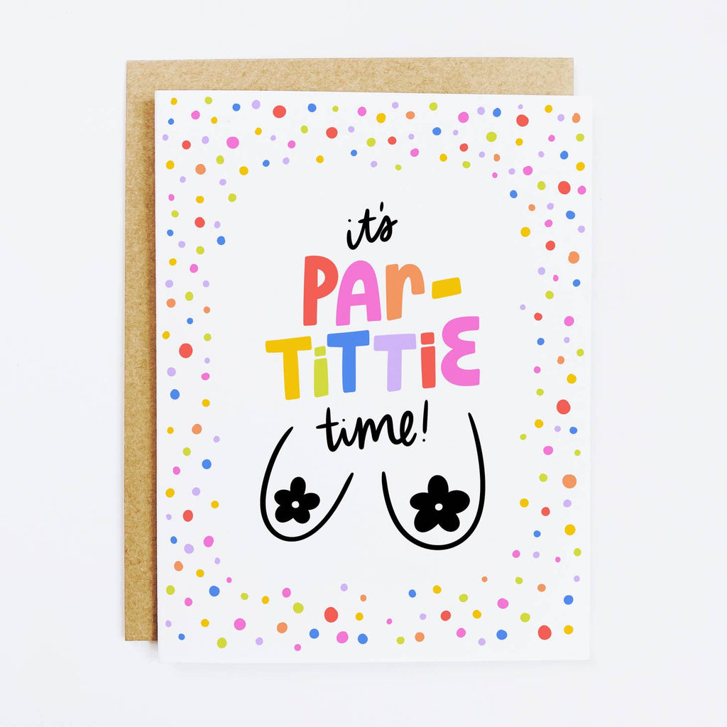 White background with colorful dots and a pair of breasts with flowers as nipples. Multicolored text says, "It's par-tittle time!". Kraft envelope included. 