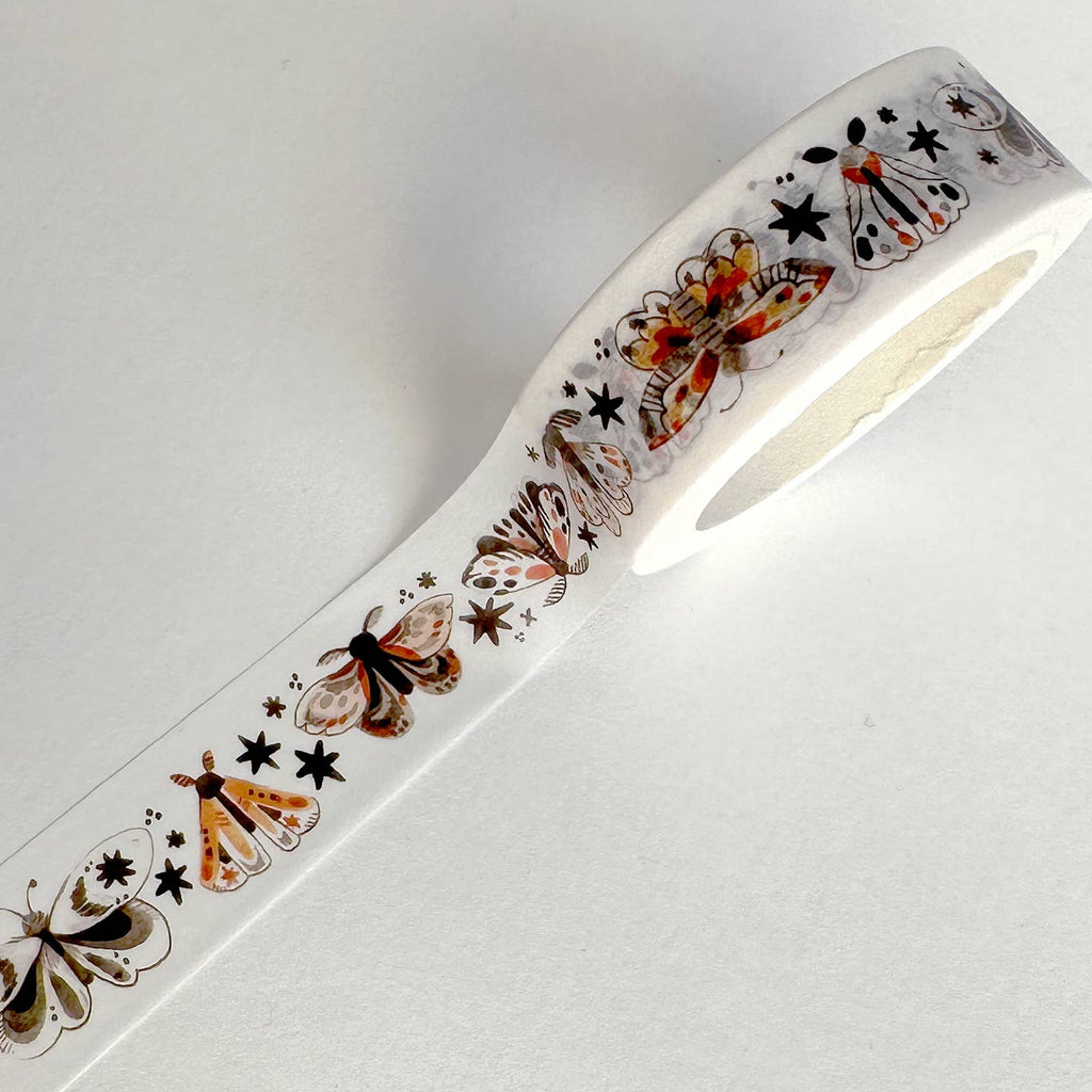 Image of washi tape with white background and images of moths in red, orange, black and tan. 
