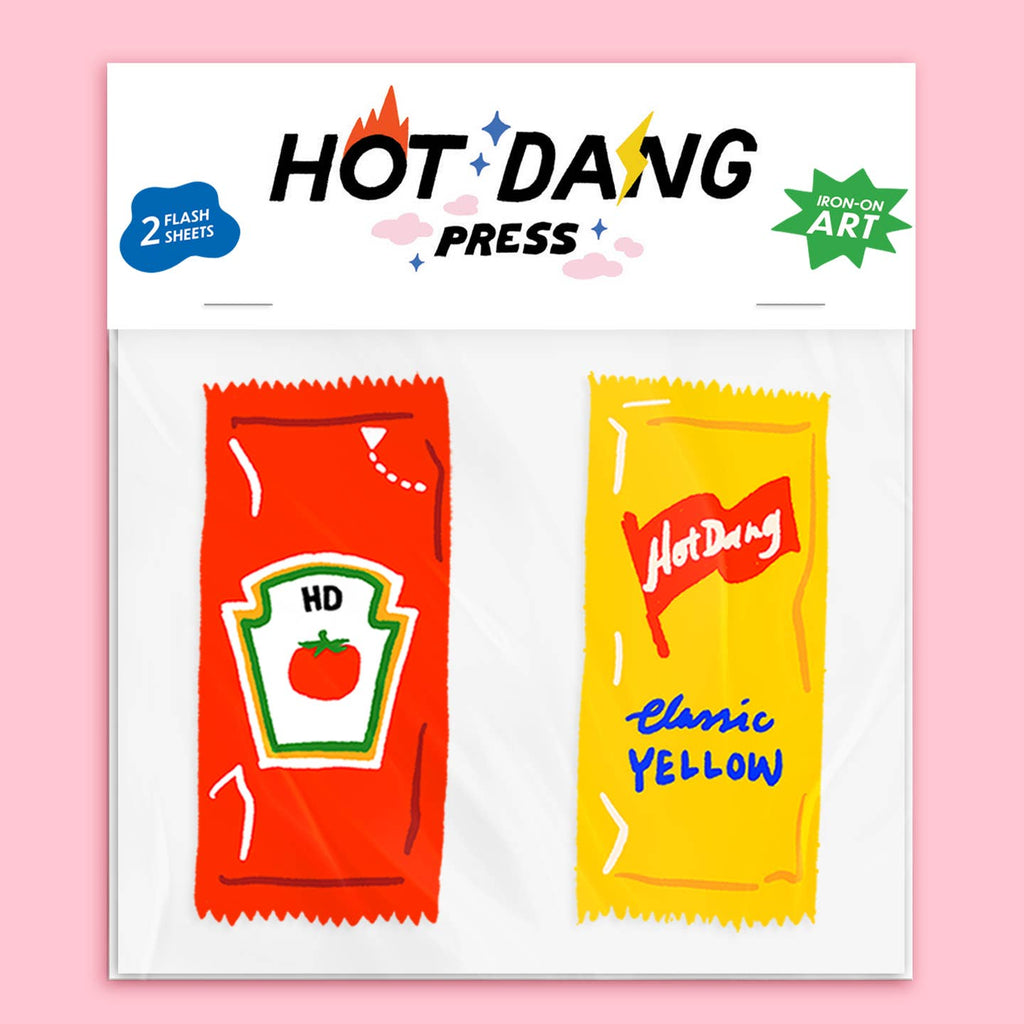 Image of iron on transfers in the shape of ketchup and mustard packets.