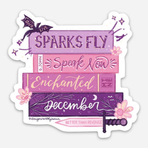 Decorative sticker with image of a stack of books in pink, lilac and purple with the names of songs on Taylor Swift's Speak Now album.