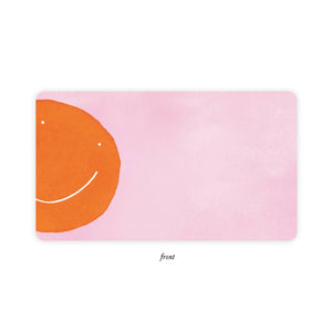 Pale pink background with image of an orange smiley face on left side.