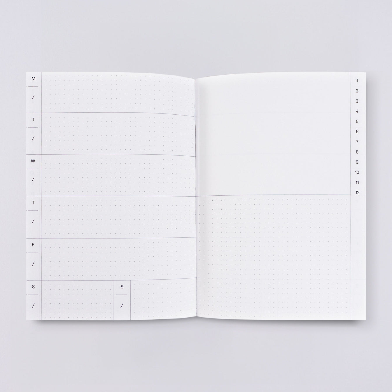 Planner page with white background and boxes for days. 