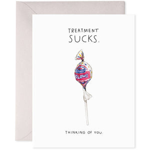 Greeting card with white background and image of a blowpop with white text says, "Cancer blows" and black text says, "Treatment sucks, thinking of you." Grey envelope included.