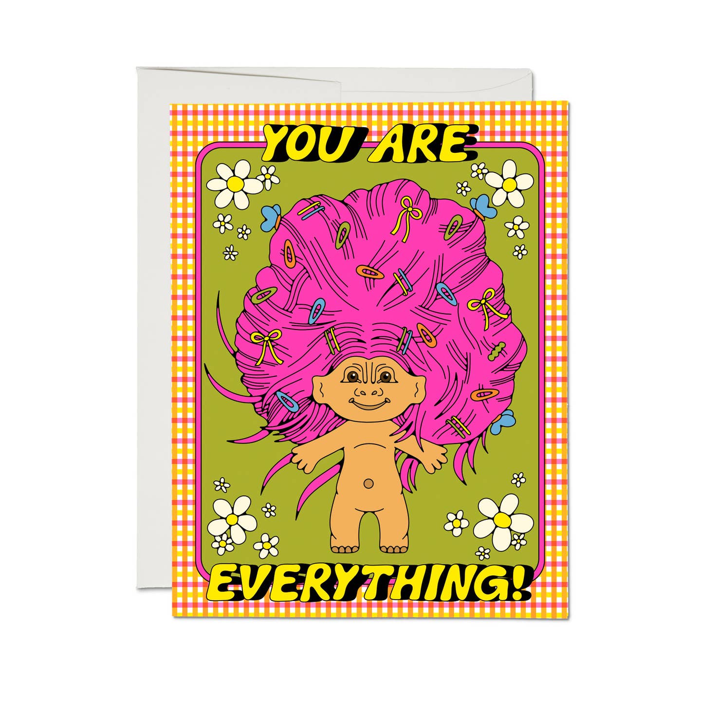 Greeting card with green background with pink and yellow plaid border. Image of a troll doll with neon pink hair filed with clips and bows and yellow text says, "You are everything!".  Envelope included.