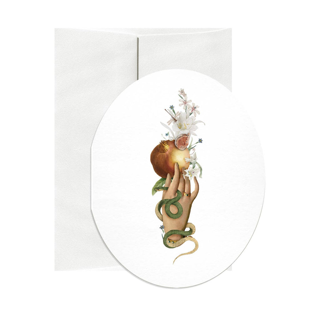 Oval greeting card with image of a hand holding a fig with a snake coiled around the fingers and wrist.   Envelope included.