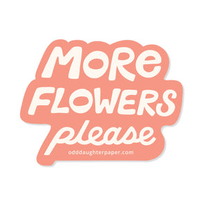 Decorative sticker with peach background and ivory text says, "More flowers please".