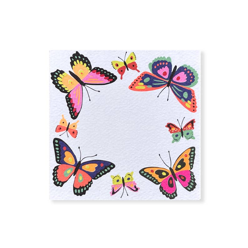 Image of notes with ivory background and images of butterflies around border in pink, yellow, pale green, red, black and blue. 