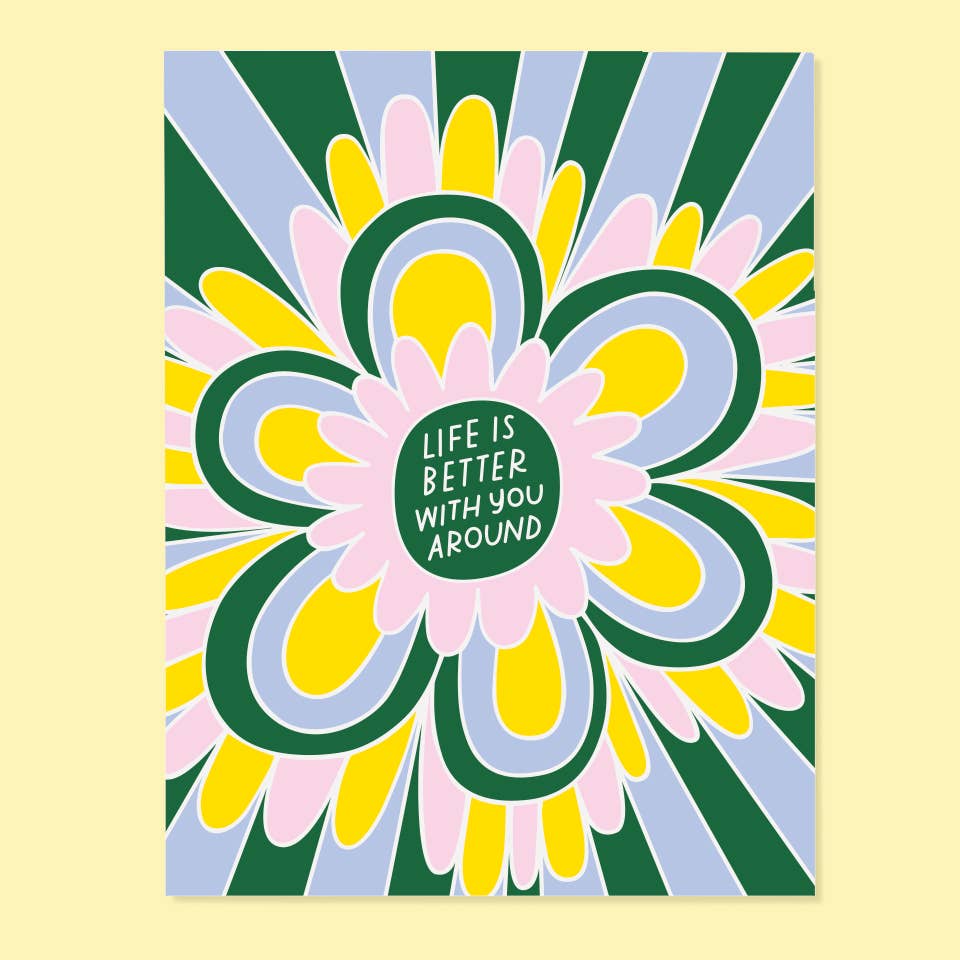 Greeting card with blue and green striped background and flower in green,yellow,  blue and pink  with green center with white text says, "Life is better with you around". Envelope included. 