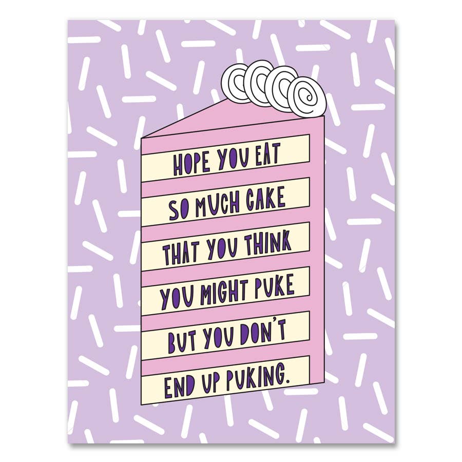 Greeting card with lavender background with white sprinkles and image of slice of cake with pink and white frosting. Purple text says, "Hope you eat so much cake that you think you might puke but you don't end up puking." Envelope included.