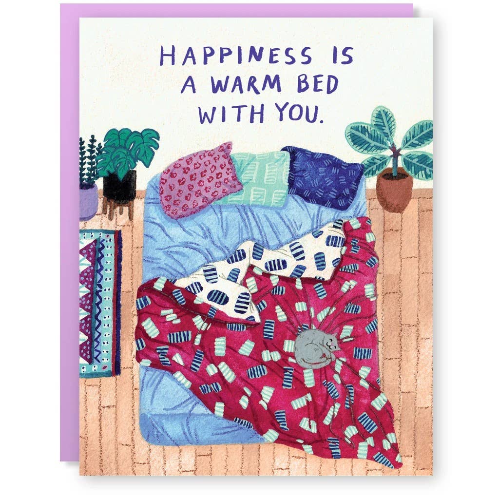 White background with image of an unmade bed with cat sleeping on comforter and blue text says, "Happiness is a warm bed with you.". Lilac envelope included.