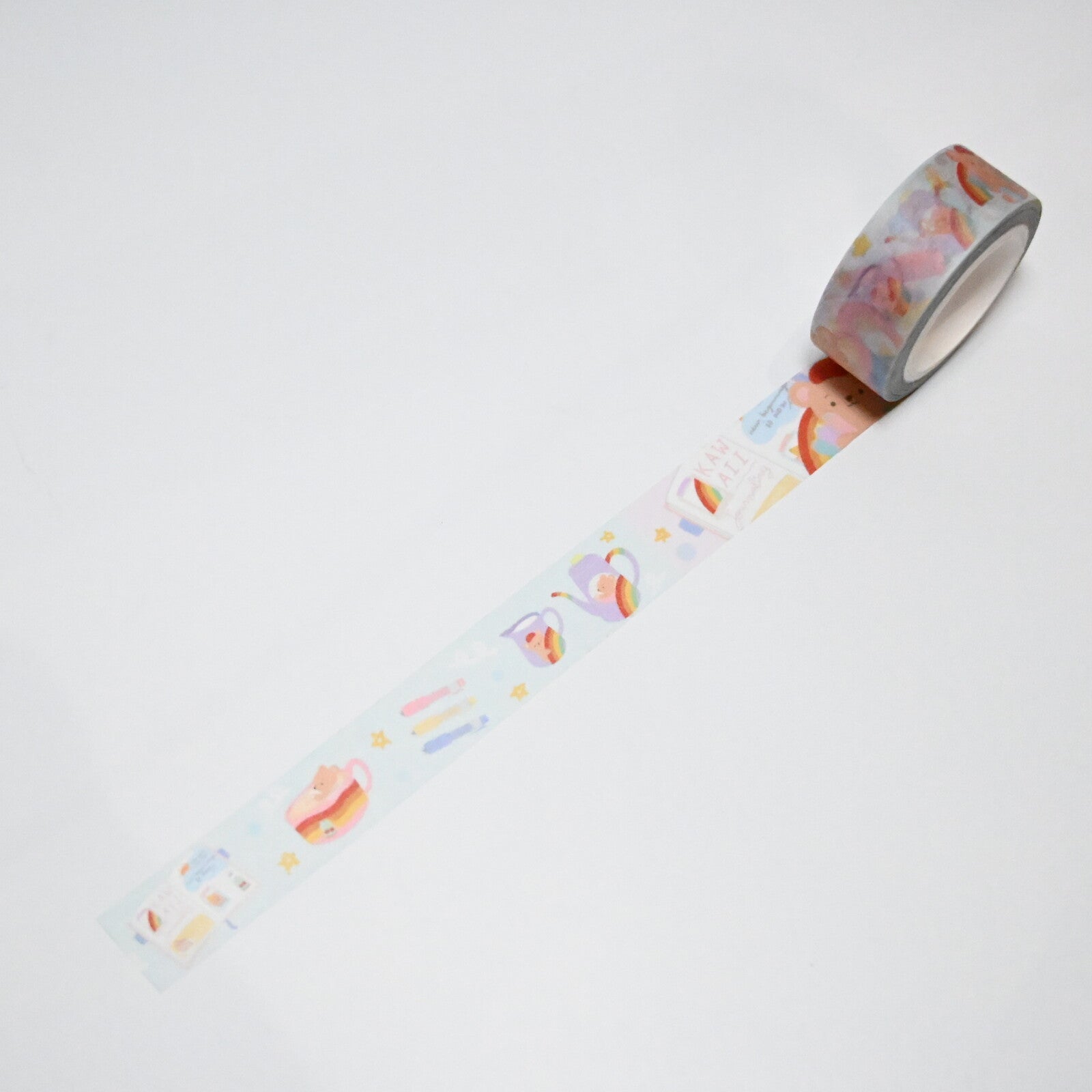 Decorative tape with blue background and images of items with rainbows on them.
