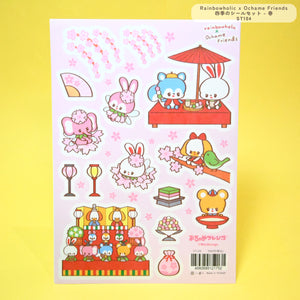 Sticker sheets with pink and blue backgrounds and images of cute animals having adventures.