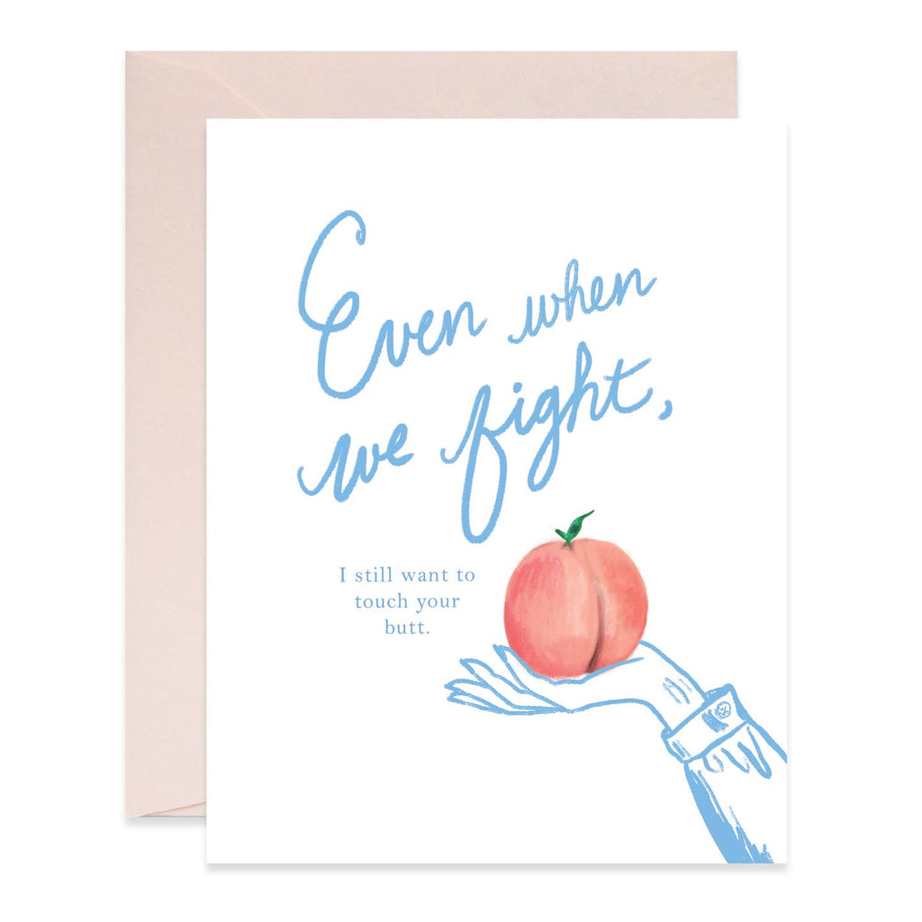 White background with image of a hand holding a peach with green stem and blue text says, “Even when we fight, I still want to touch your butt.”. A peach colored envelope is included. 