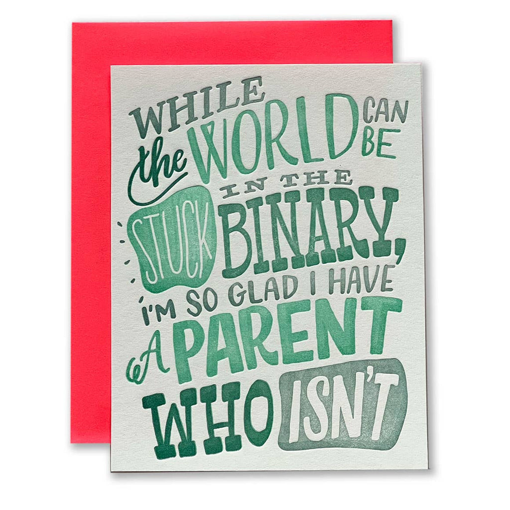 White background with green and grey text says, “While the world can be stuck in the binary, I’m so glad I have a parent who isn’t”. A red envelope is included.  