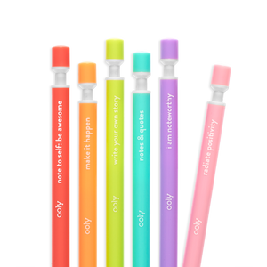 Image of box of mechanical pencils in pastel rainbow colors with inspirational sayings in white text, “Note to self: be awesome”, “make it happen”, “notes and quotes”, “I am noteworthy”, and “radiate positivity”. 