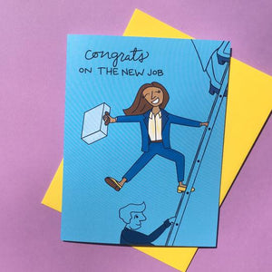 Blue card with black text saying, “Congrats On The New Job”. Images of a woman with brown hair wearing a blue suit climbing a ladder, representing the corporate ladder. A yellow envelope is included.