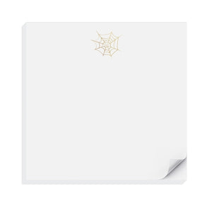 White background with image of gold foil spider web at top center.            