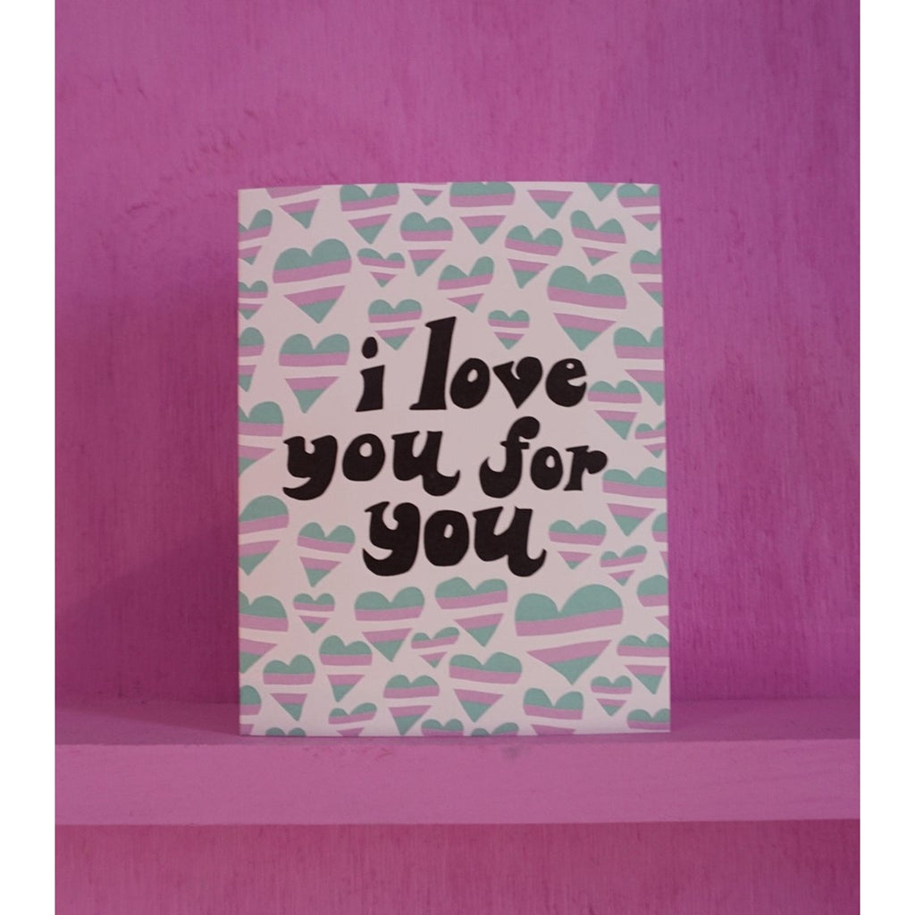 Light pink card with black text saying, "I Love You For You". Images of multicolored hears scattered. An envelope is included.