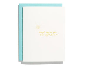 White card with yellow script text saying, “Though They Are Gone, Their Light Shines On”. Image of a yellow sunshine. A light blue envelope is included.