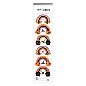 White background with images of rainbows in purple, yellow, black and orange with bats, pumpkins, caldrons on the ends. 