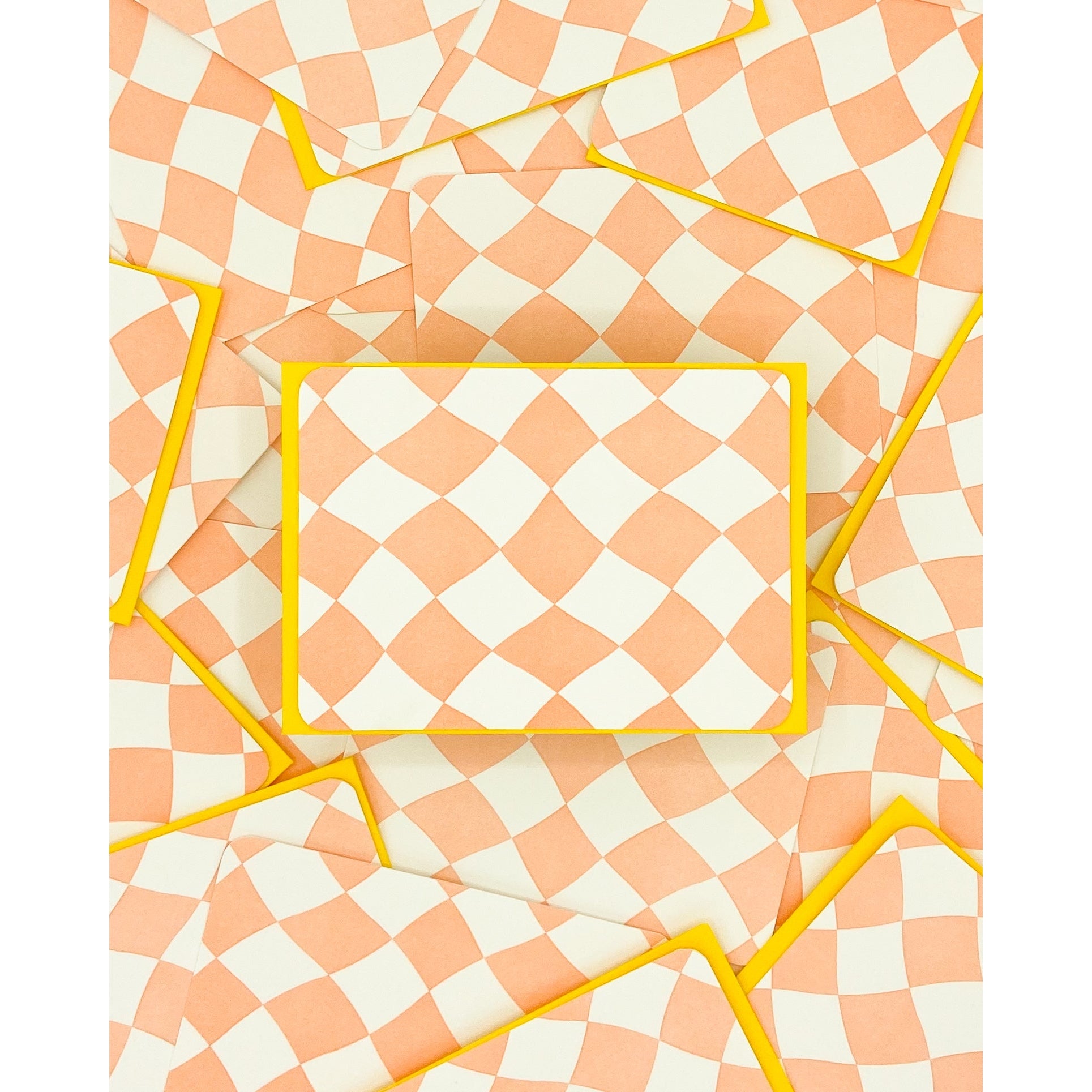 Peach and white wavy checkered pattern with neon yellow envelopes.             