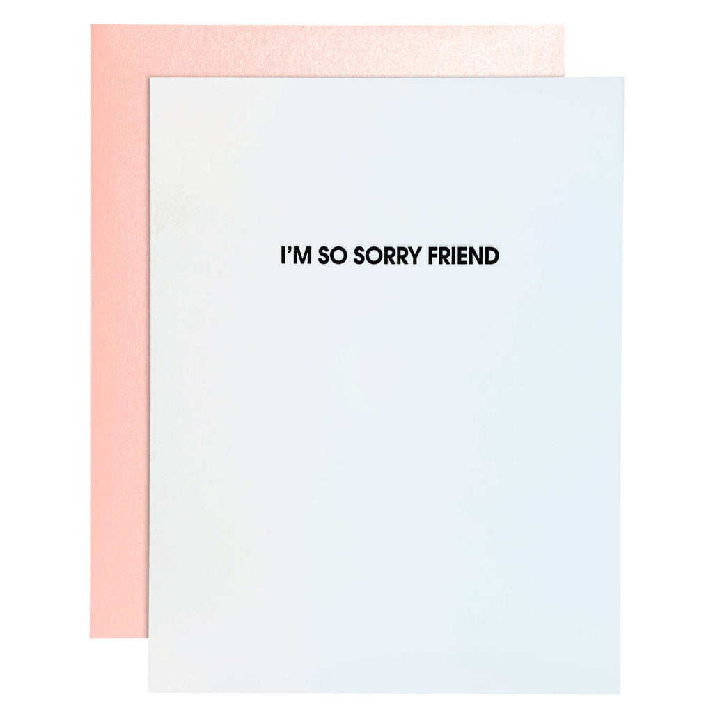 White card with black text saying, “I’m So Sorry Friend”. A light pink envelope is included.